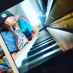 Virtual Piano Student learns from New York State